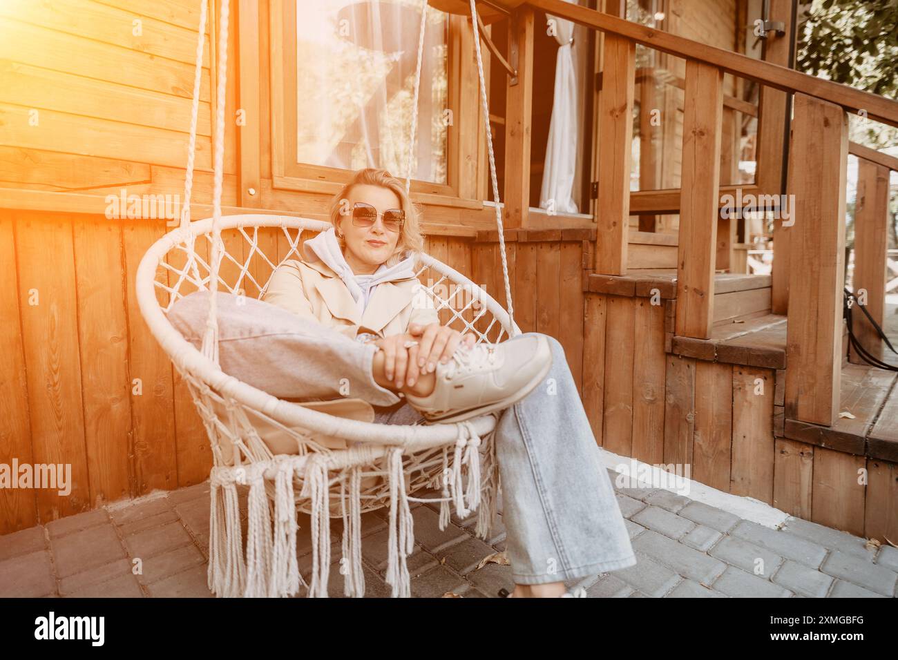 Jacket hanging in chair hi-res stock photography and images - Alamy