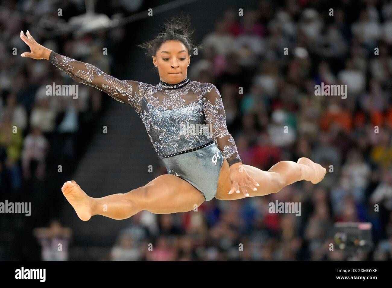 Simone Biles, of United States, competes on the floor exercise during a ...