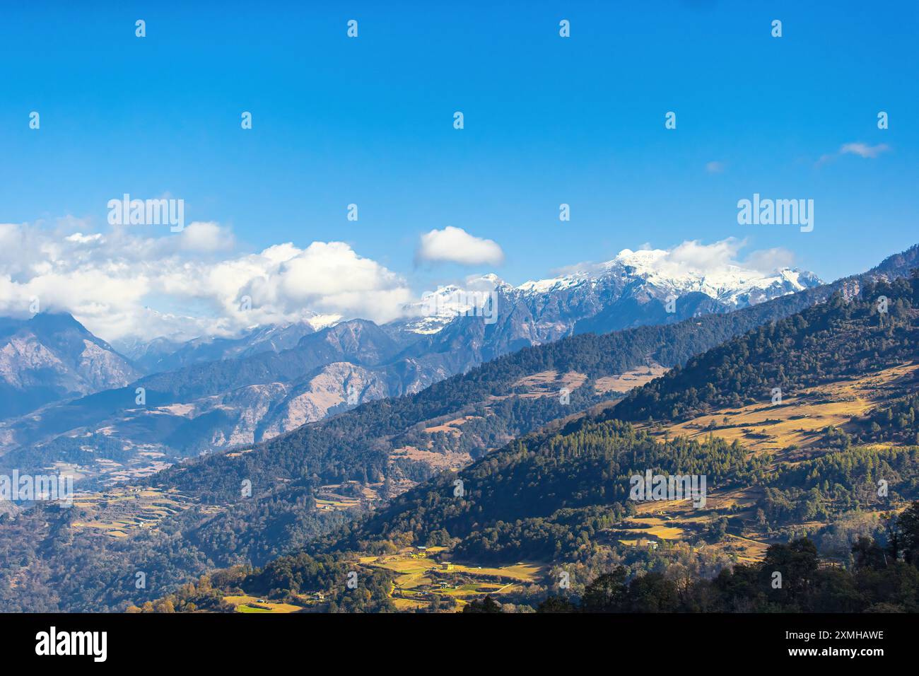 Landscape of Bhutan with the Himalayas Stock Photo - Alamy