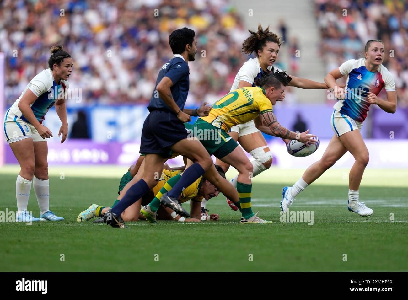 Women Rugby Sevens Ruck Brazil's Raquel Kochhann passes the ball out from a ruck during the ...
