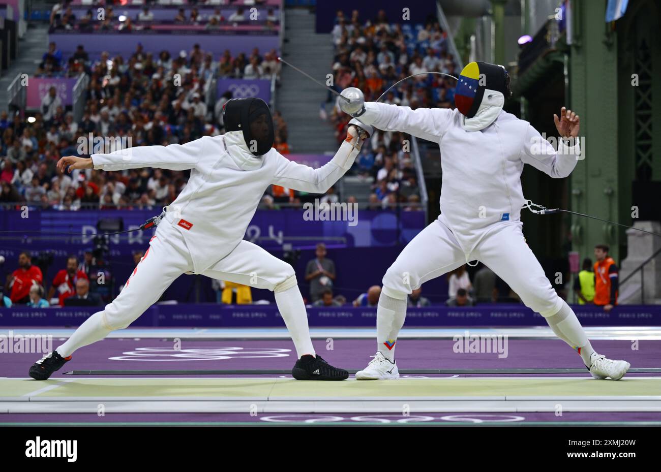Paris, France. 28th July, 2024. Wang Zijie (L) of China competes with ...