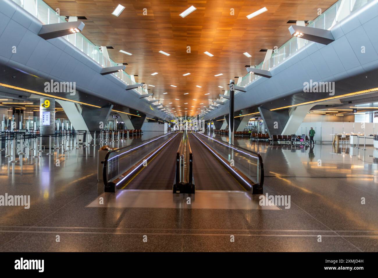 Hamad Intl DOHA, QATAR - APRIL 4, 2020: Interior of Hamad International Airport in ...