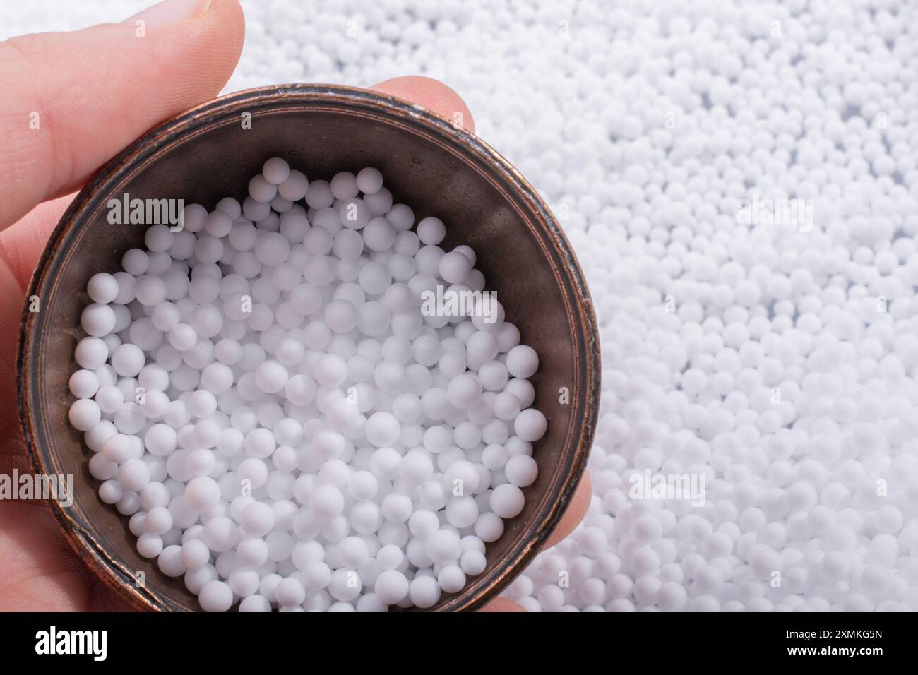 White little polystyrene foam balls as background Stock Photo