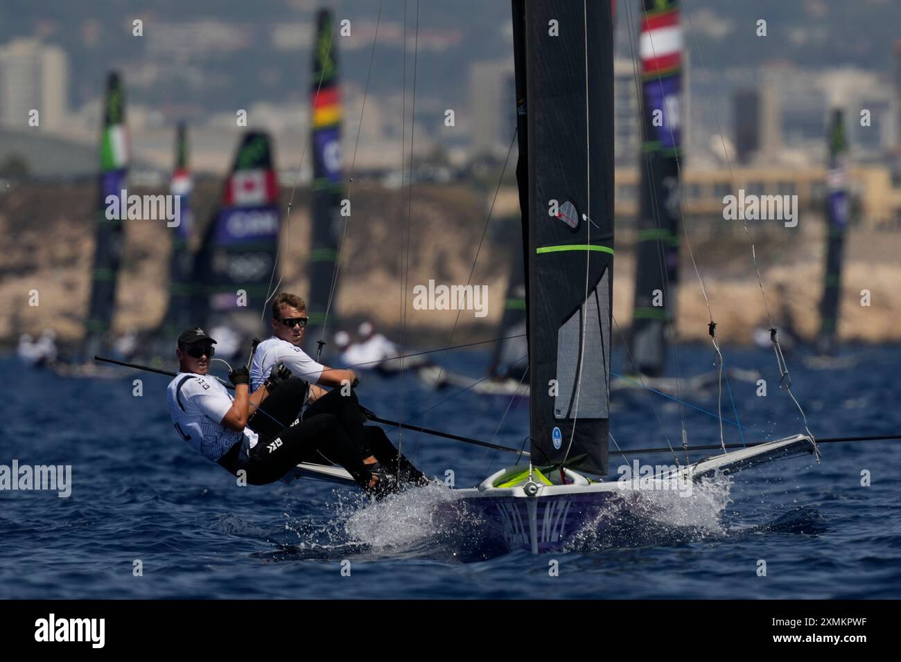 Isaac McHardie and William McKenzie of New Zealand sail during a men's ...