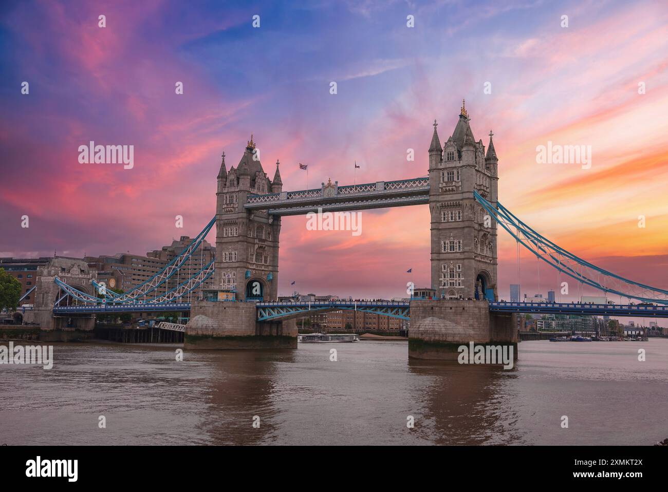 Tower Bridge at Sunset with Vibrant Sky and Cityscape in London, UK Stock Photo