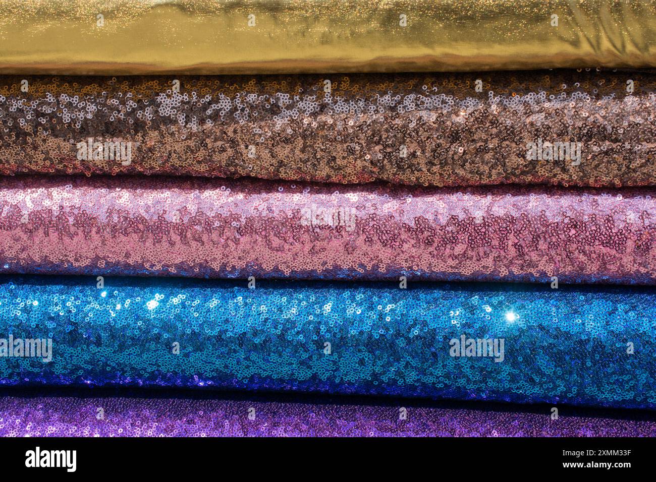 Examples of bright fabric of various color in view Stock Photo - Alamy