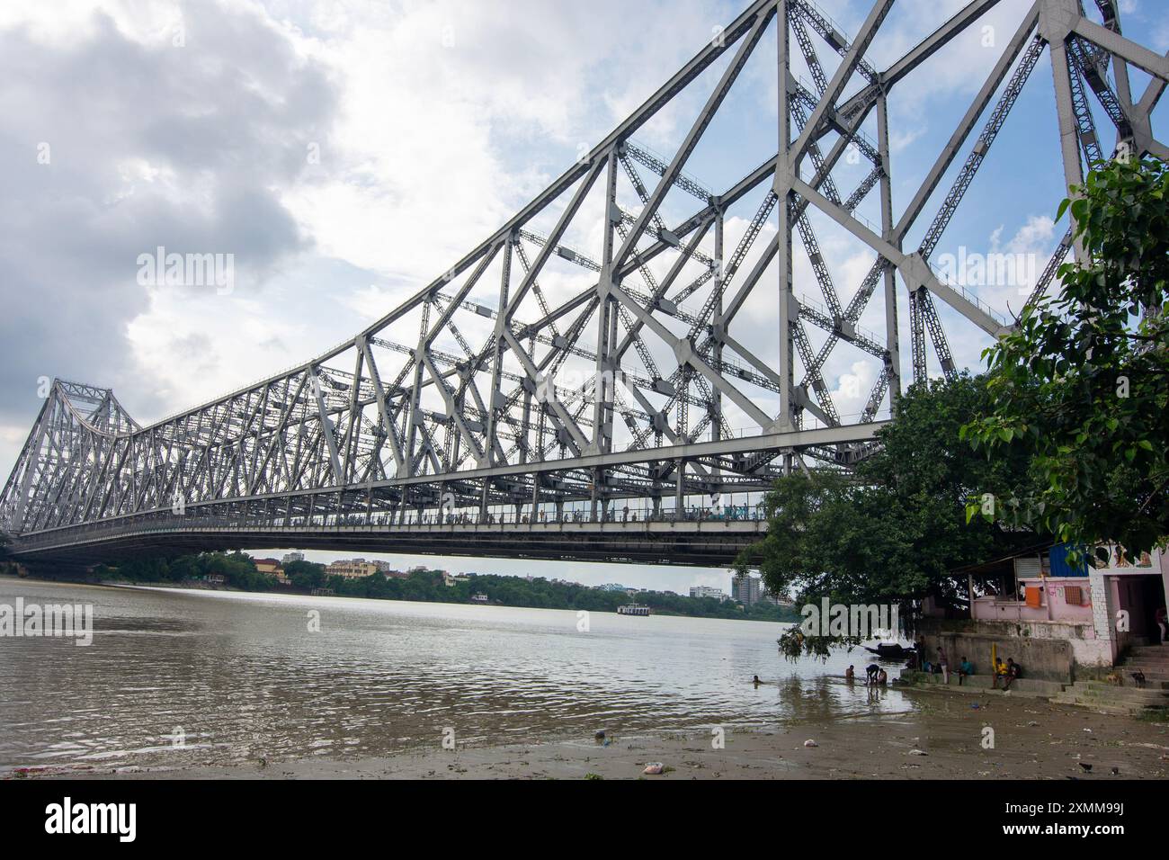 An iconic landmark in Kolkata, the Howrah Bridge is a huge steel bridge ...
