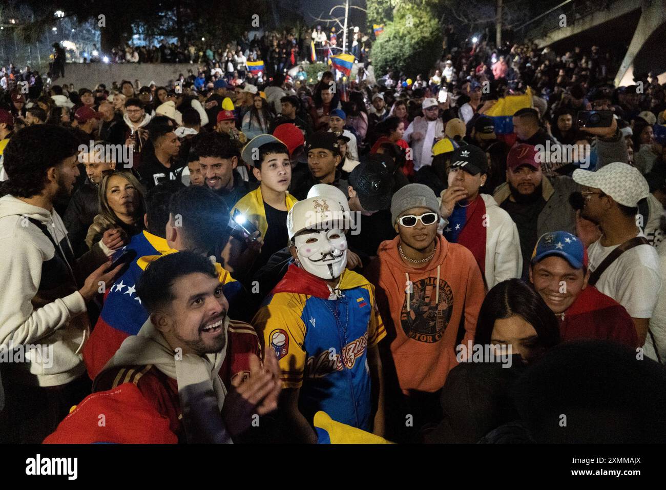 Santiago, Metropolitana, Chile. 28th July, 2024. Venezuelan citizens opposed to Nicolas Maduro and in favor of Corina Machado and Edmundo Gonzalez, wait for the results of the presidential elections near the Venezuelan embassy in Santiago, Chile. (Credit Image: © Matias Basualdo/ZUMA Press Wire) EDITORIAL USAGE ONLY! Not for Commercial USAGE! Stock Photo