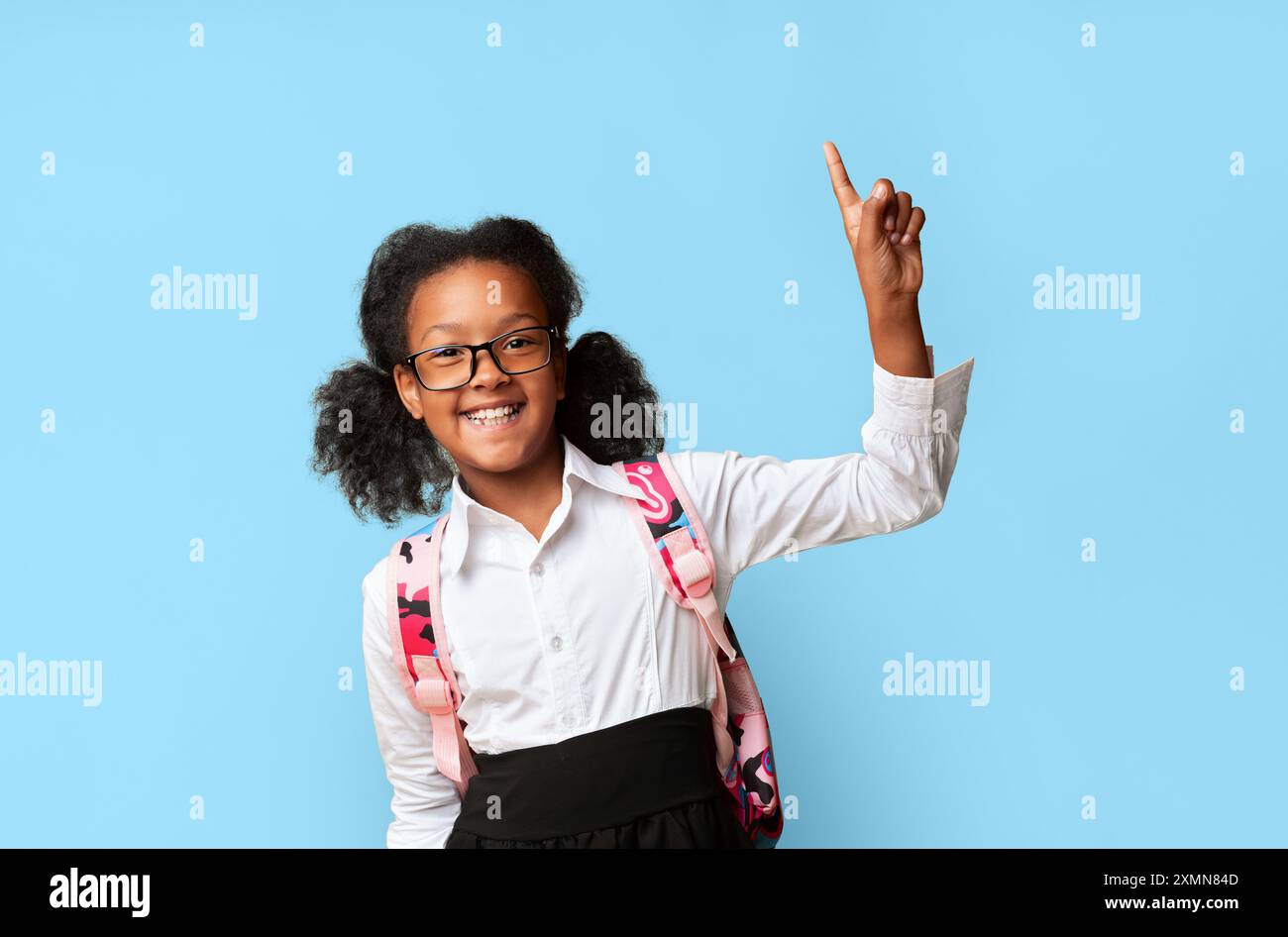 Smiling Schoolgirl Pointing Finger Up Having Question Over Yellow ...