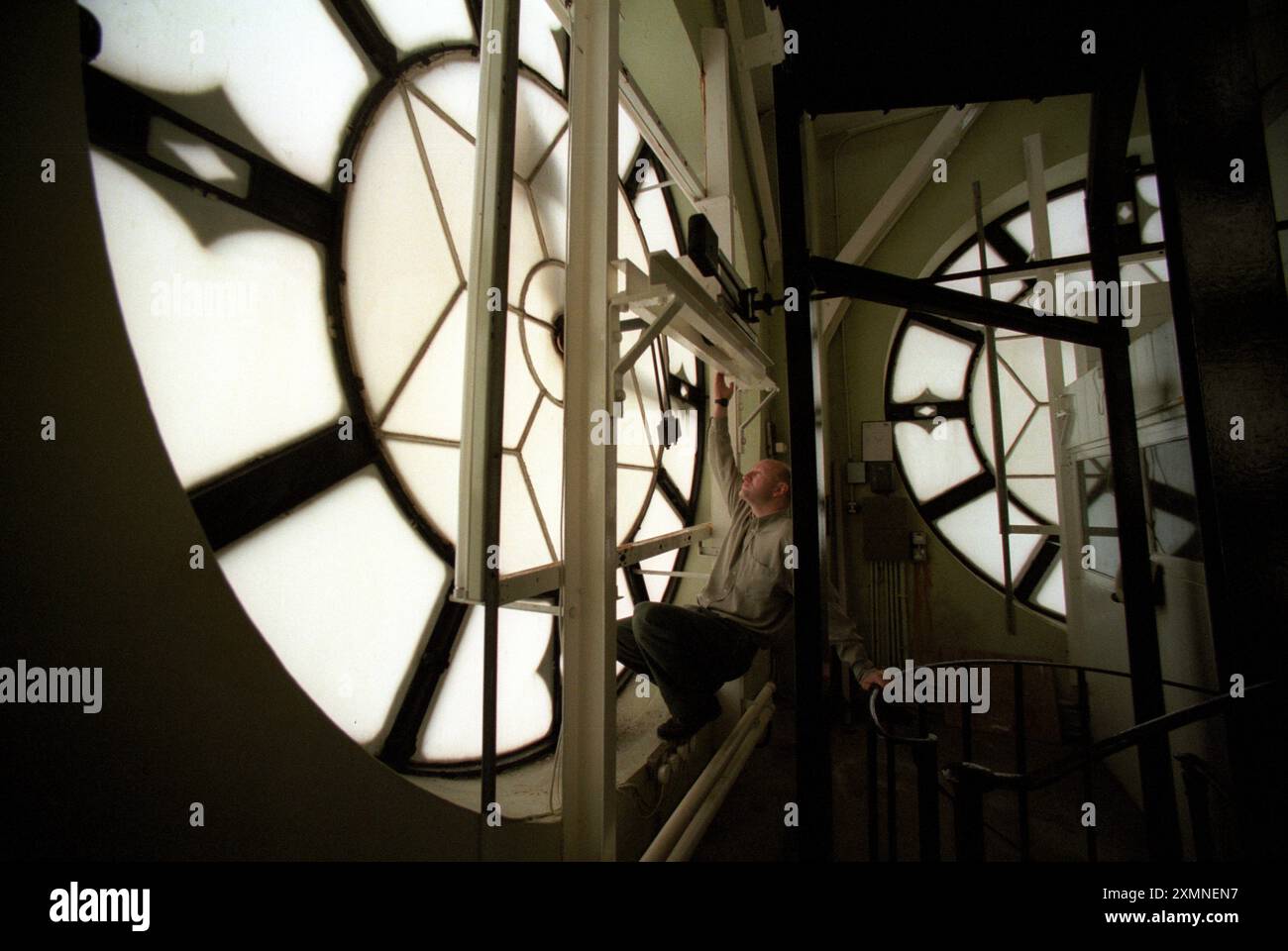 Isaac Watts , hymn writer and 250th anniversary event co-ordinator examines the 1933 built Southampton Civic Centre clock face which chimes a Watts hymn 'OUr God our help in ages past' every four hours   22 November 1998    Pictdur by Roger Bamber Stock Photo