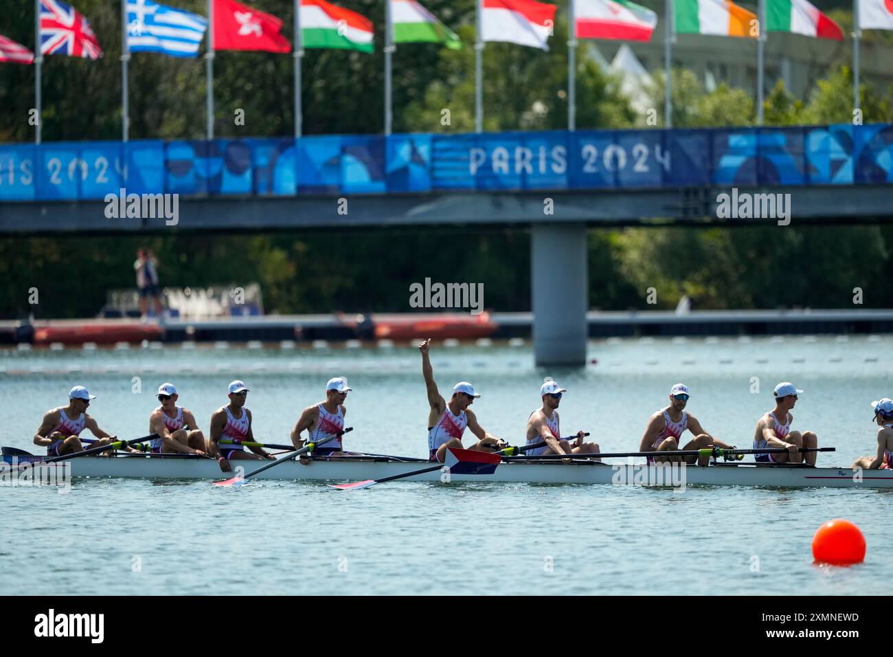 The United States Team reacts at the end of the men's rowing eight ...
