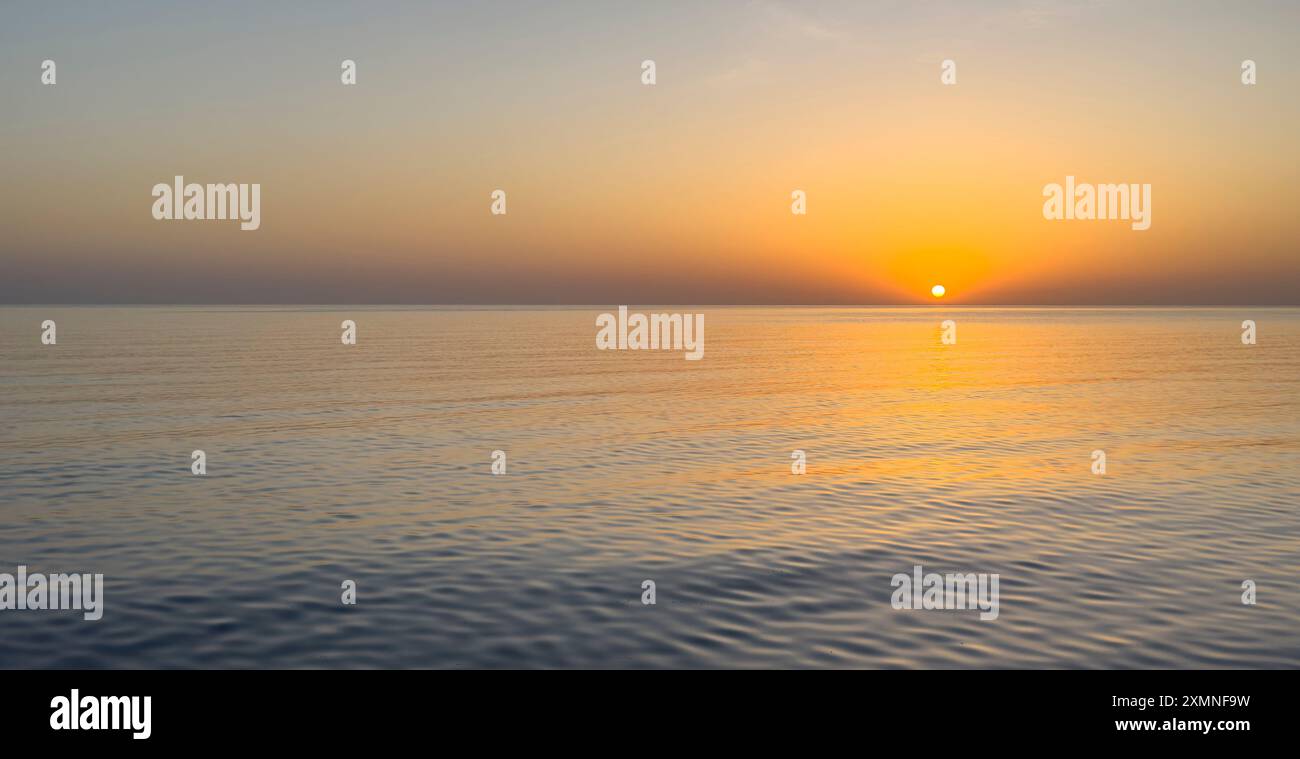 sunset over the sea Stock Photo