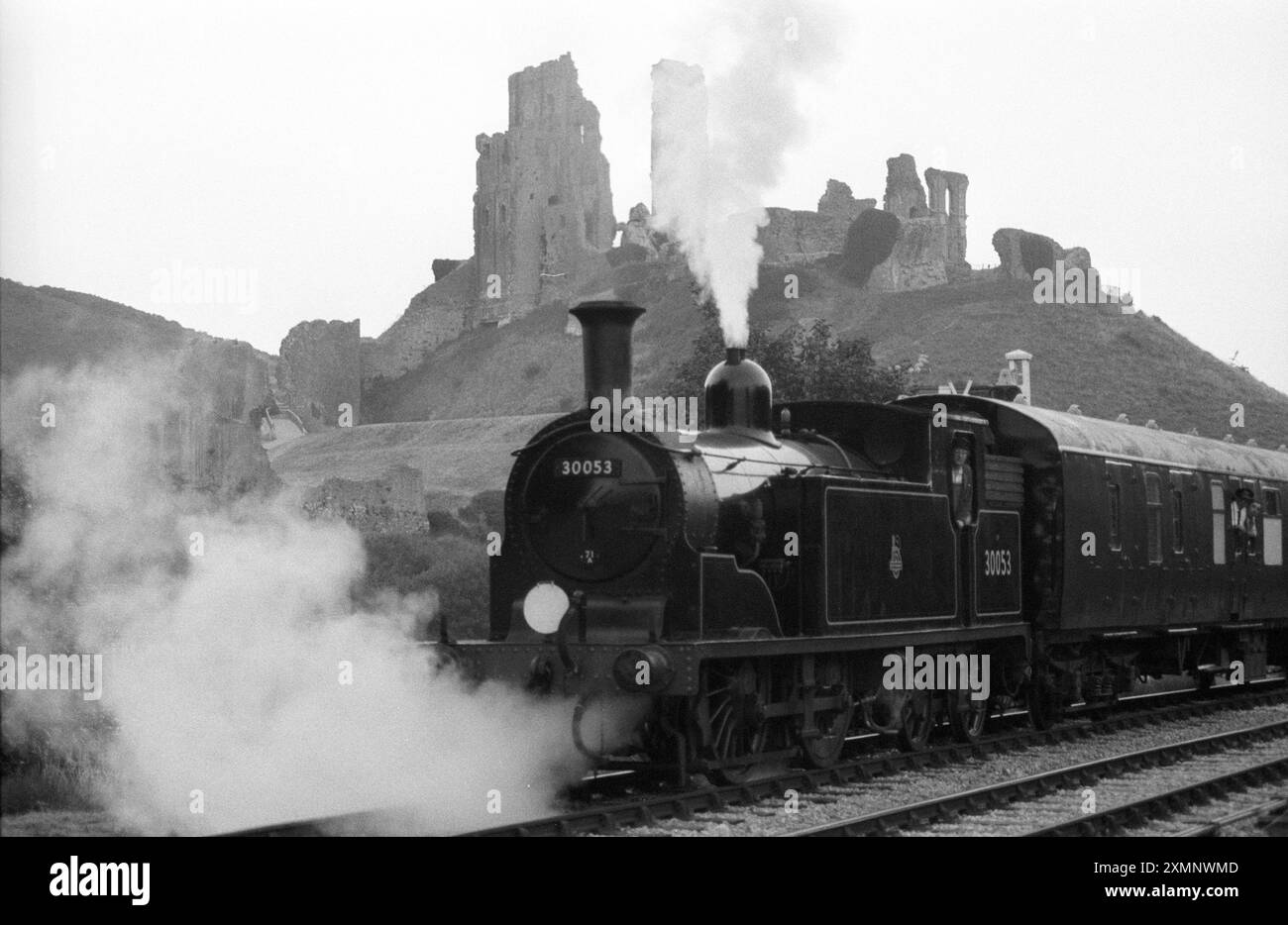 A Drummond design Class M7 Southern steam tank locomotive 30053 pulls ...
