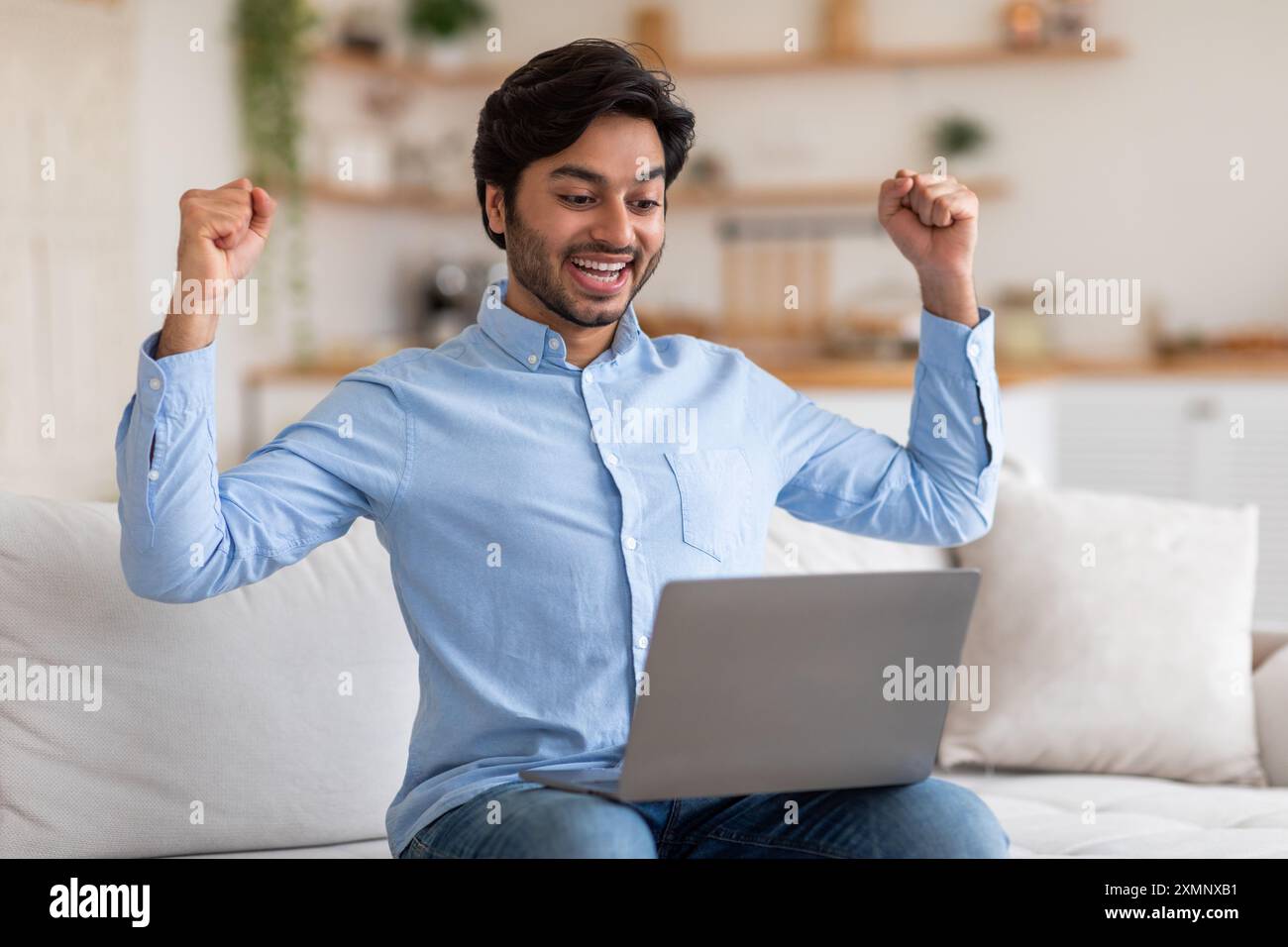 Young muslim man celebrating online hi-res stock photography and images ...