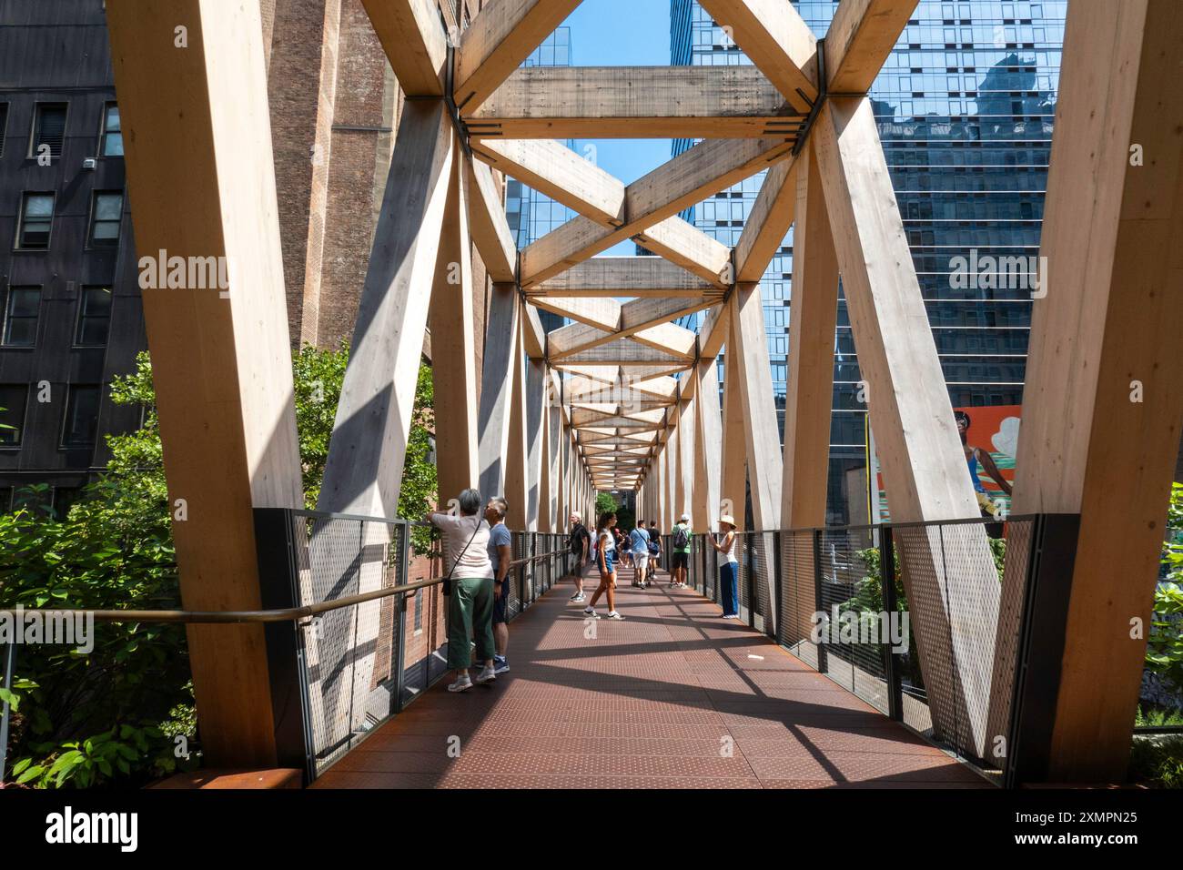 The Tmber Bridge is a composite wooden bridge located in Hudson Yards, 2024, New York City, USA Stock Photo