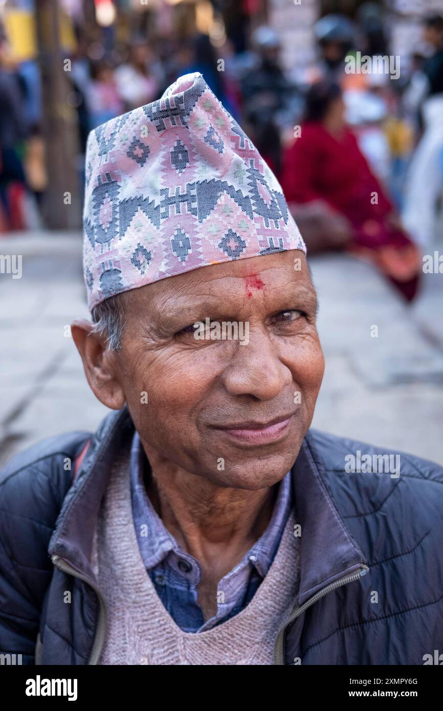 Nepalese Gentleman Wearing Traditional Dhaka Topi Cap Or Hat In Streets 