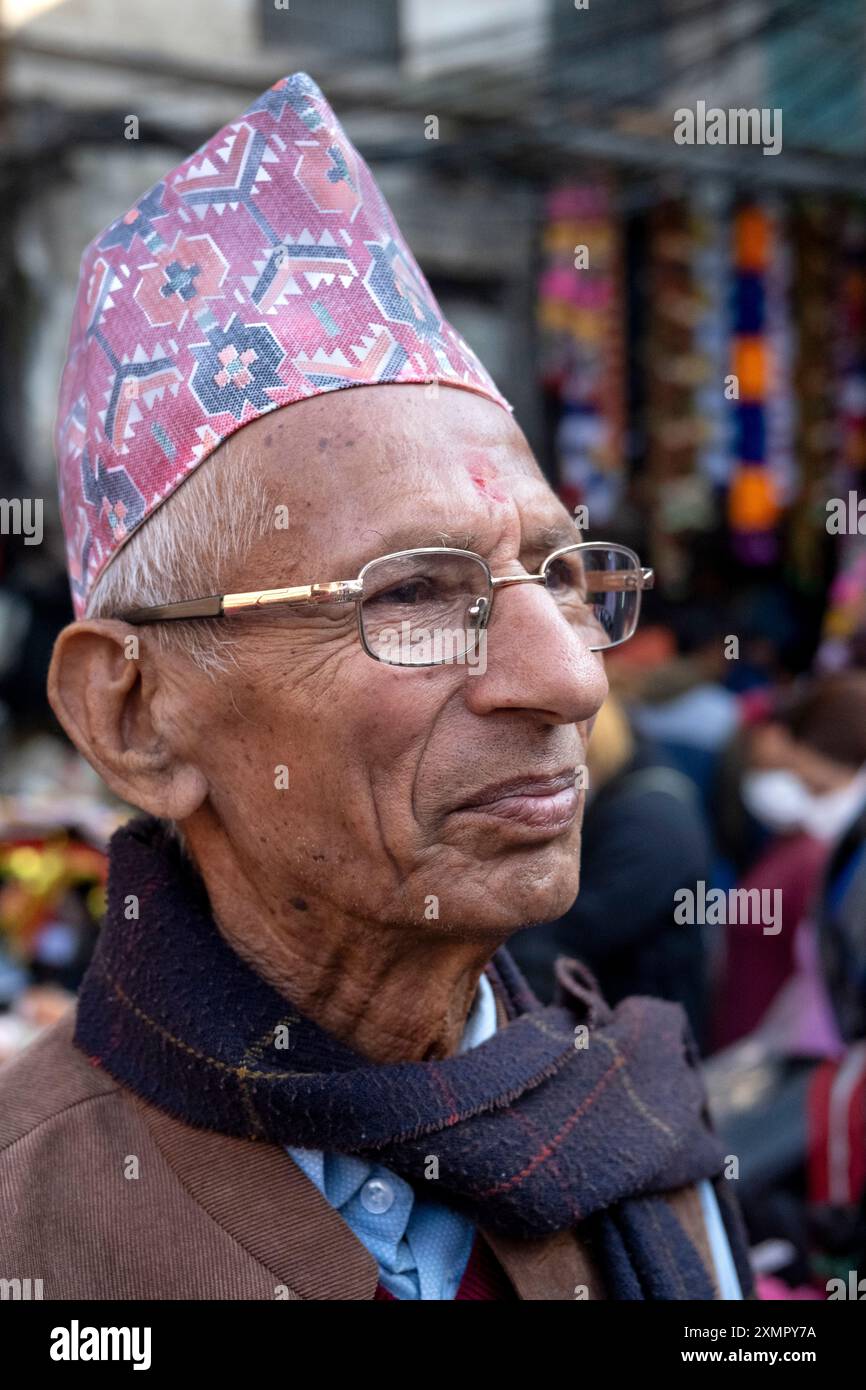 Nepalese Gentleman Wearing Traditional Dhaka Topi Cap Or Hat In Streets 