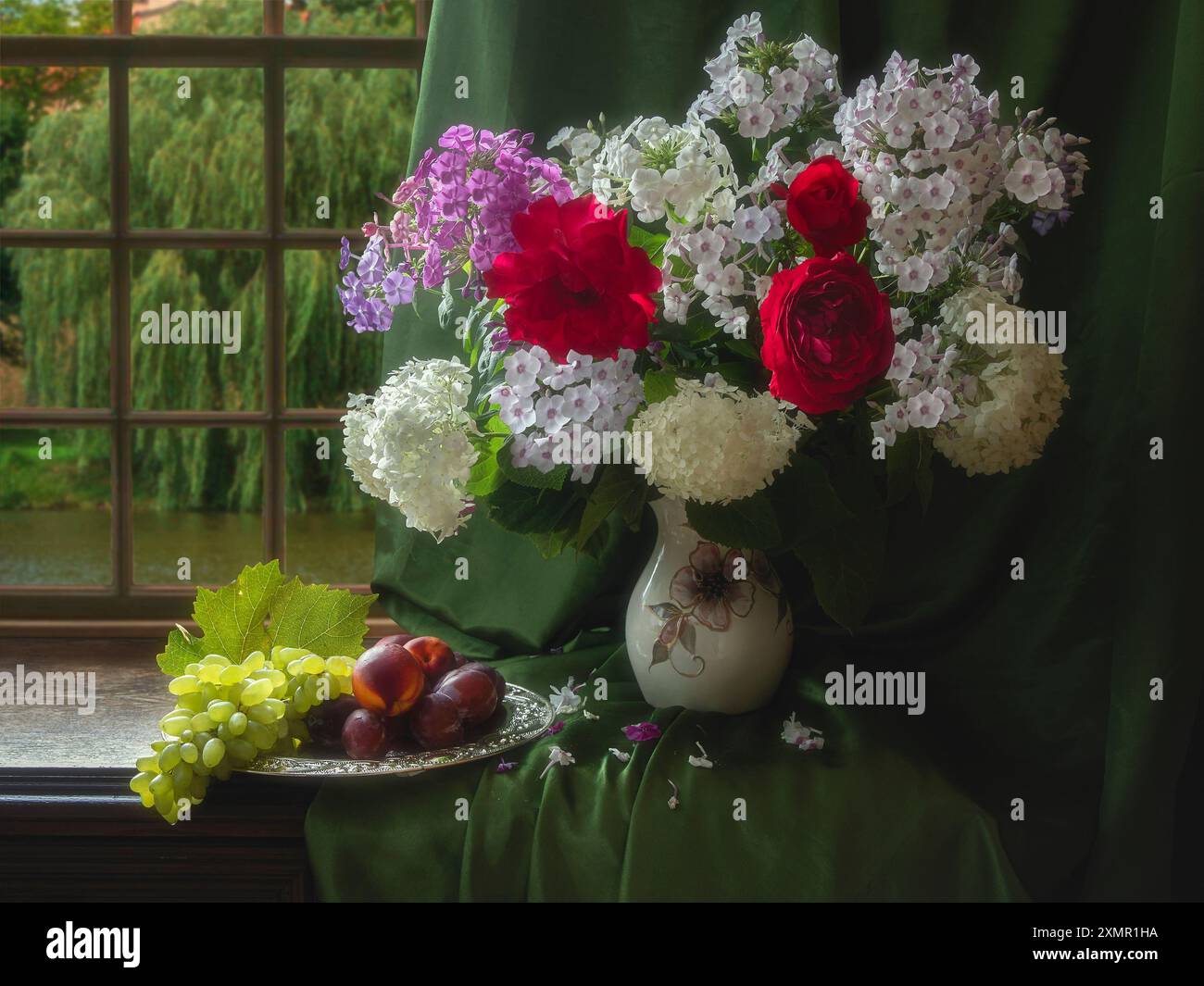 Still life with bouquet of flowers and fruits Stock Photo - Alamy