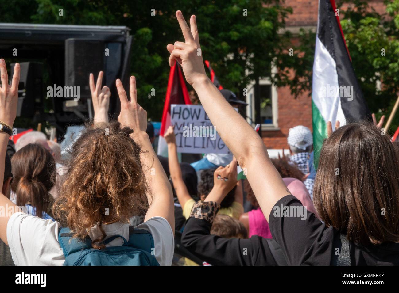 Crowd of people marching in demonstration in solidarity with Palestine Stock Photo
