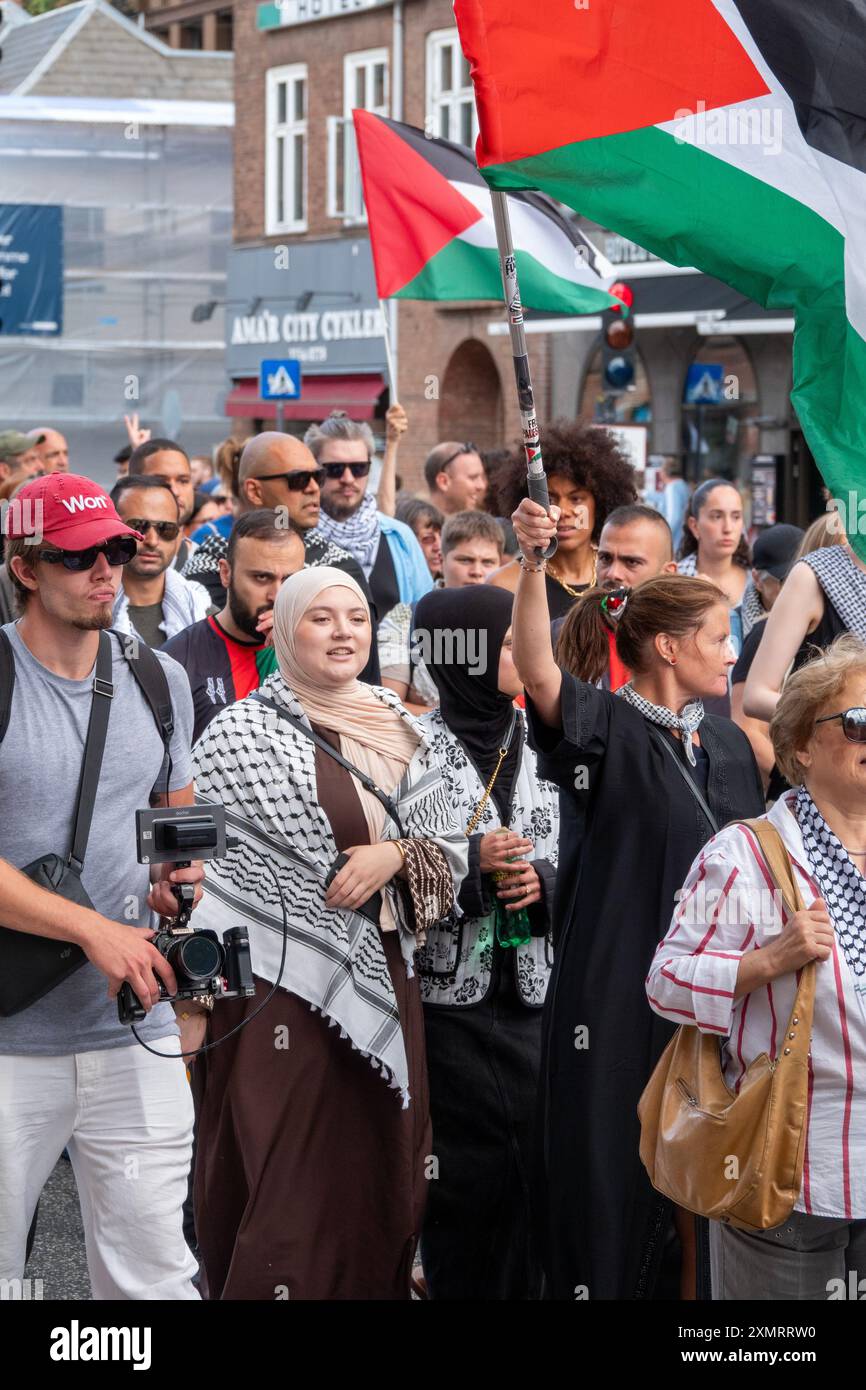 Crowd of people marching in demonstration in solidarity with Palestine Stock Photo