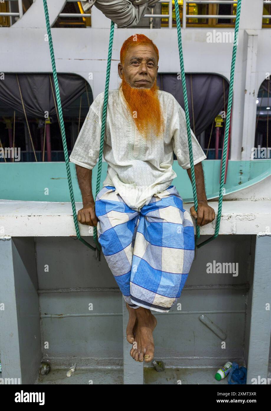 Ferry to Barisal passenger with red beard, Dhaka Division, Dhaka, Bangladesh Stock Photo