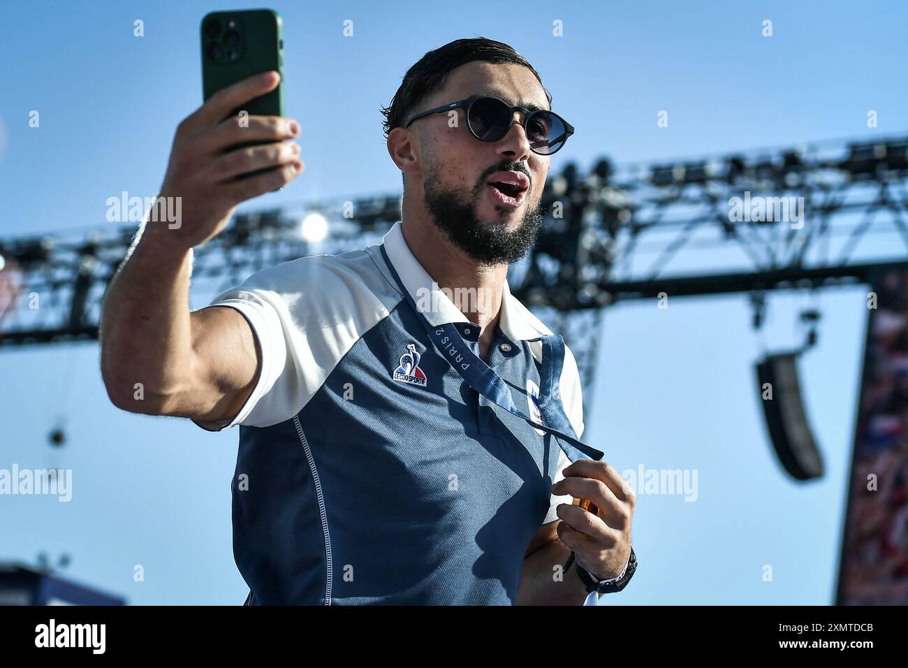 France’s golden medalist rugby team player Rayan Rebbadj celebrates as