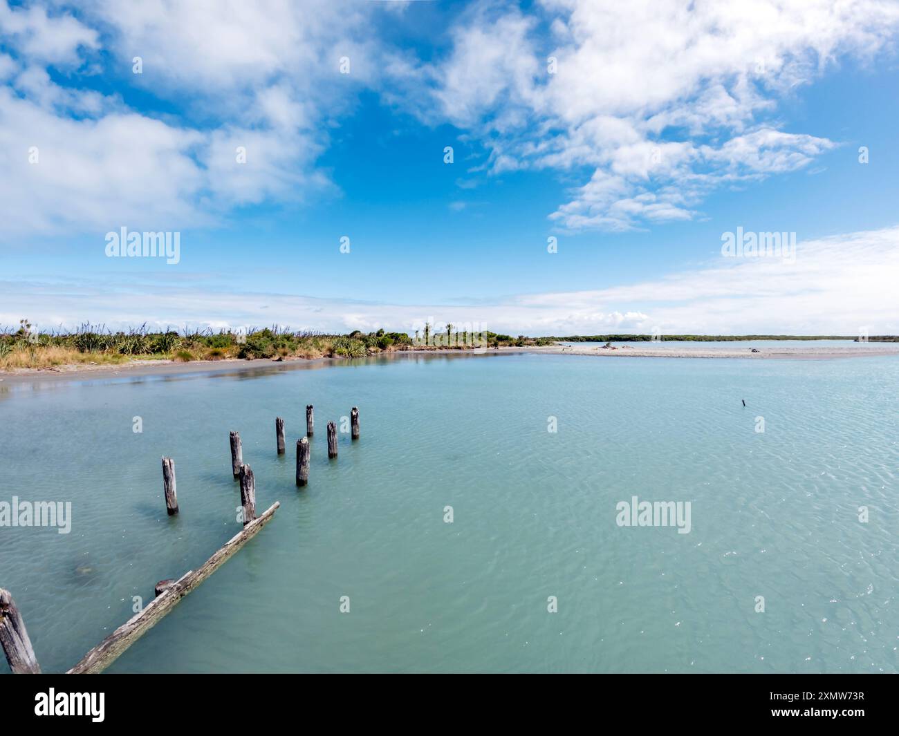 Okarito Lagoon, New Zealand - A Coastal Haven for Bird Watching, Eco-Tours, and Kayaking Adventures Stock Photo