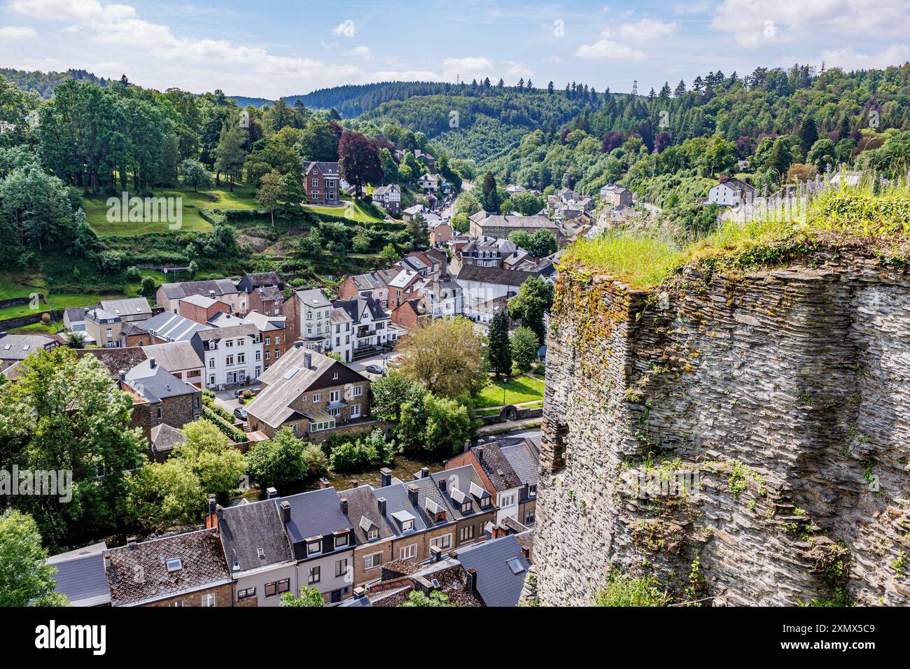 Cityscape and weathered wall at castle ruins of La Roche-en-Ardenne ...