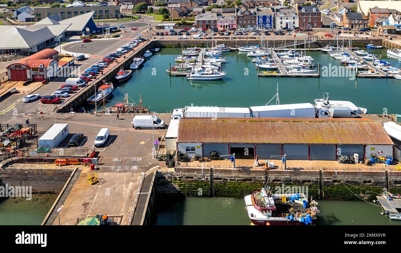 Arbroath Angus Scotland the inner harbour wet dock or marina fish shed and coloured houses of Shore Street Stock Photo