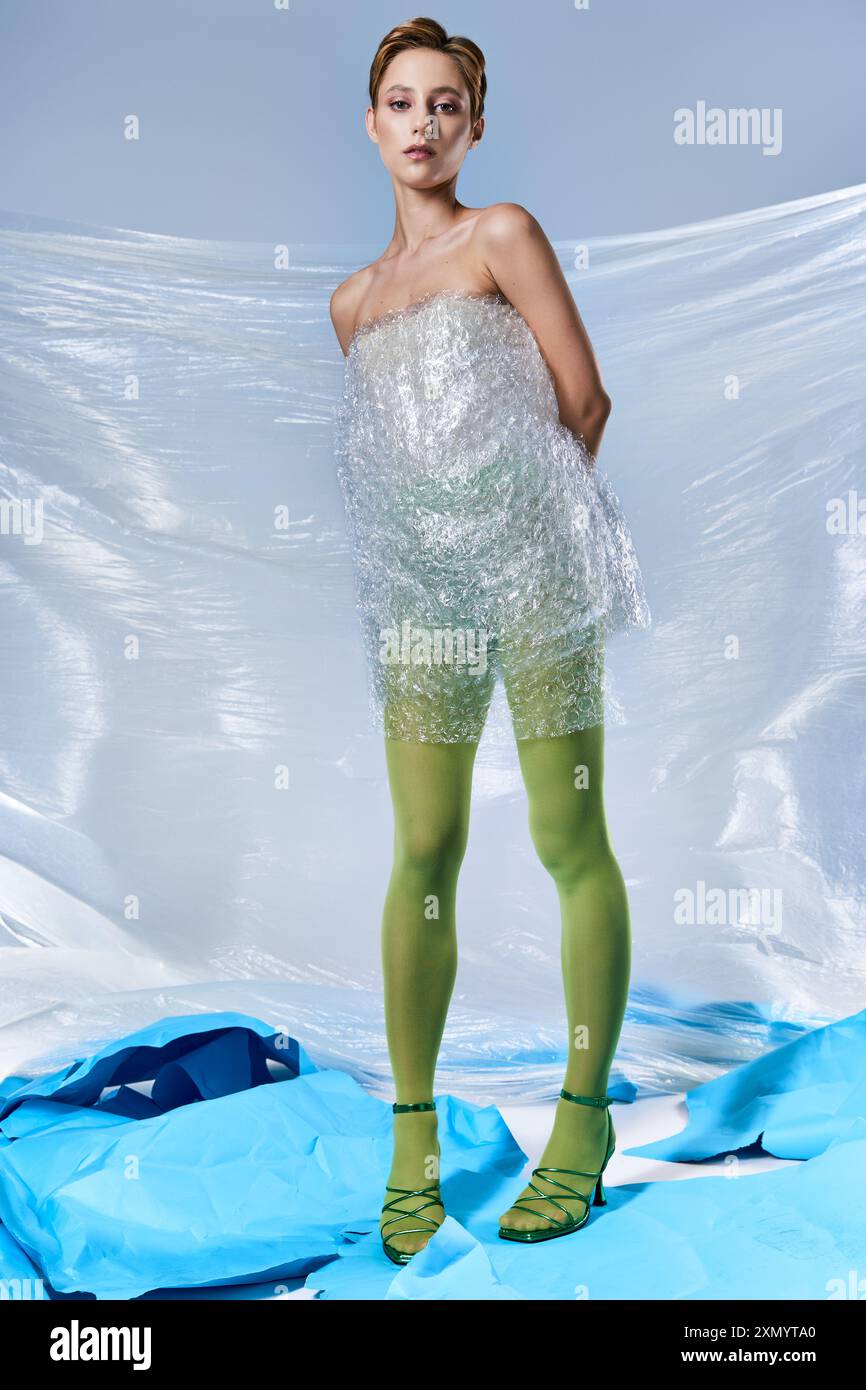 A woman stands with a plastic bubble wrap dress and green tights Stock Photo - Alamy A woman stands with a plastic bubble wrap dress and green tights Stock Photo - Alamy