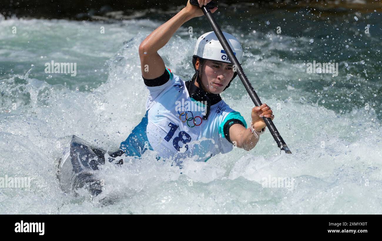 Juan Huang of China competes in the women's canoe single heats at the ...