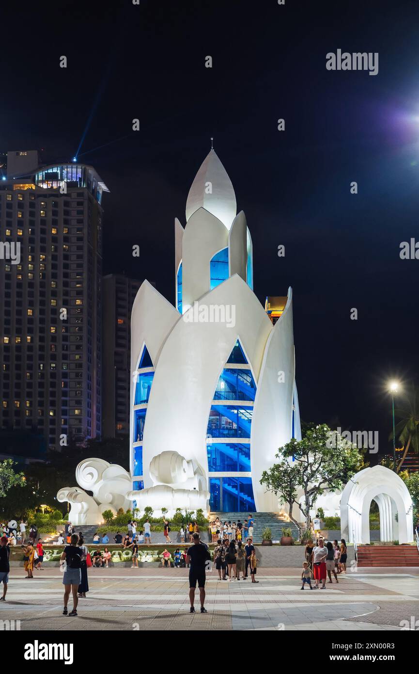 Lotus Tower Thap Tram Huong in the center of Nha Trang city on the waterfront at night. Nha Trang, Vietnam - July 17, 2024 Stock Photo