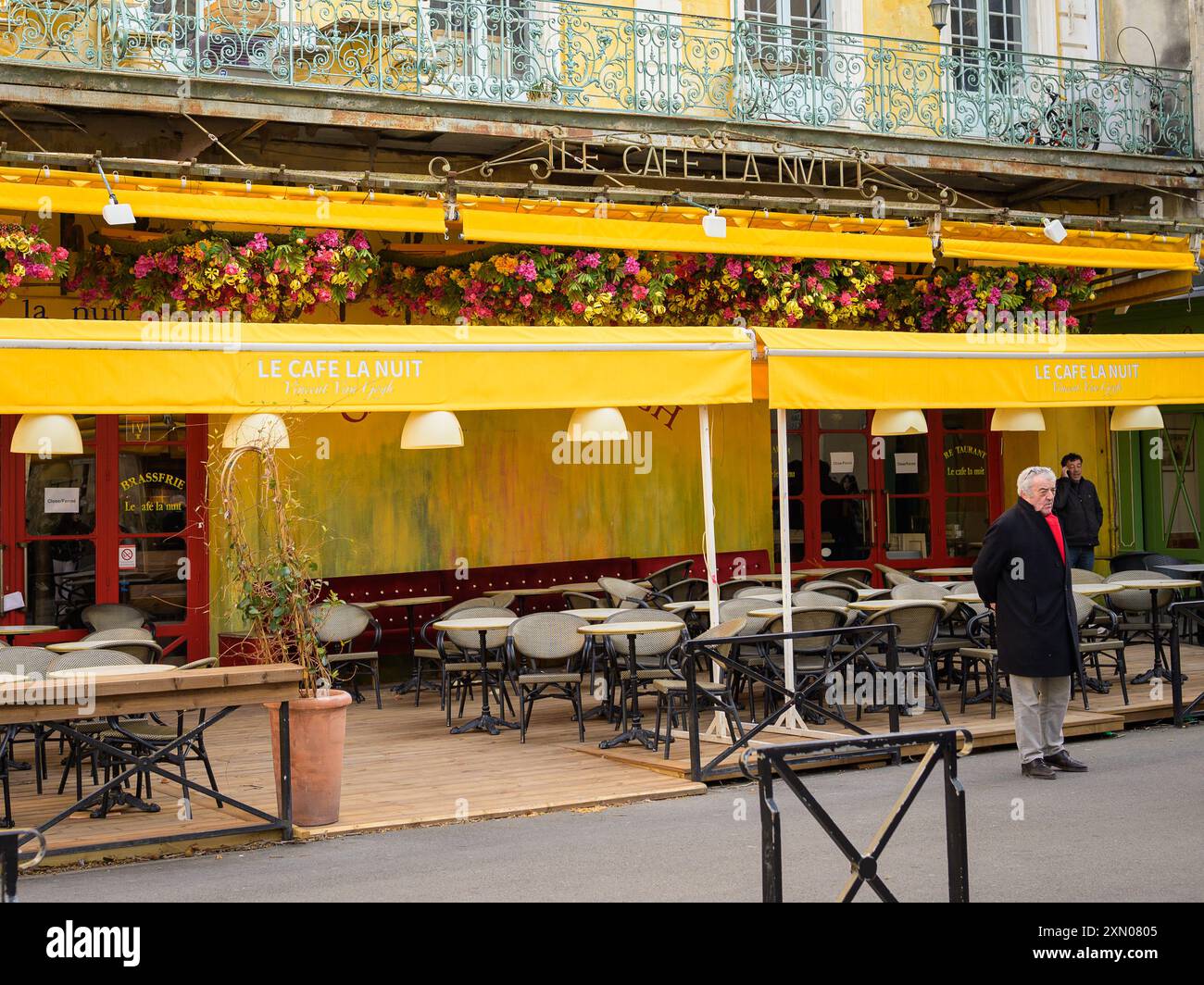 Arles, France - March 3, 2023: Le Cafe Van Gogh on Place du Forum on a cloudy day in springtime Stock Photo