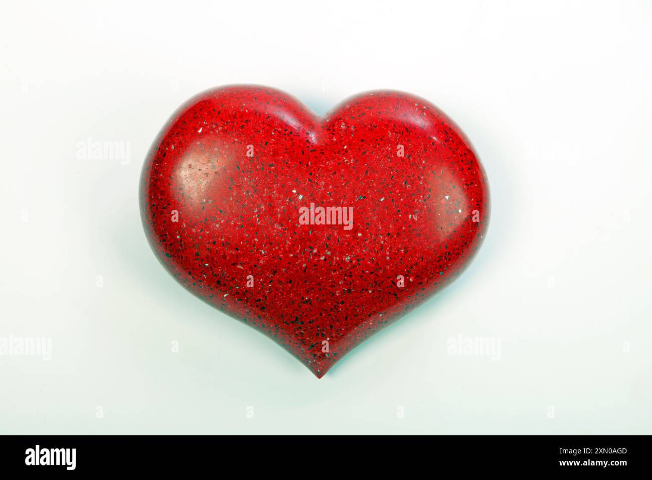 Heart made from Red Quartz with sparkles Stock Photo