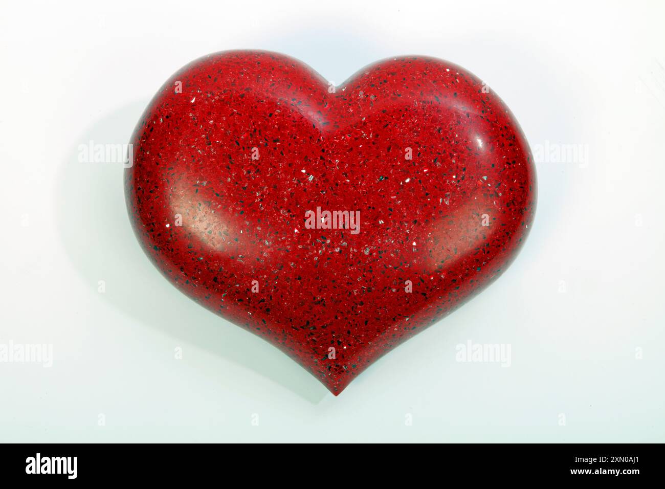 Heart made from Red Quartz with sparkles Stock Photo