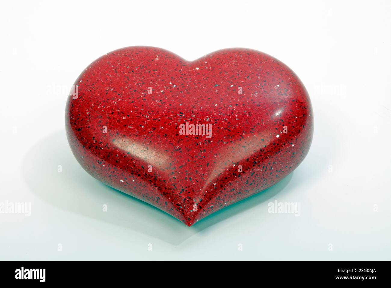 Heart made from Red Quartz with sparkles Stock Photo