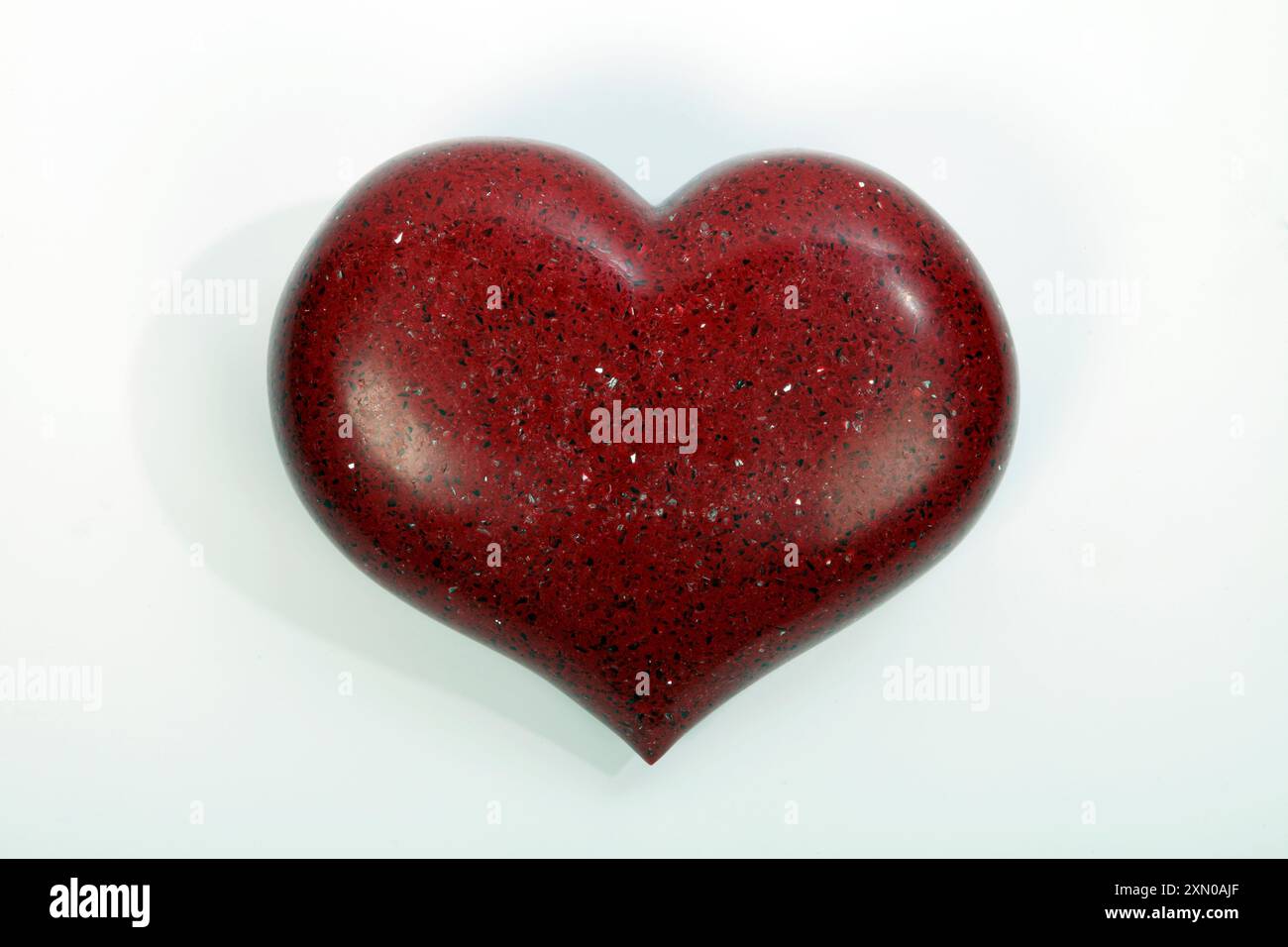 Heart made from Red Quartz with sparkles Stock Photo