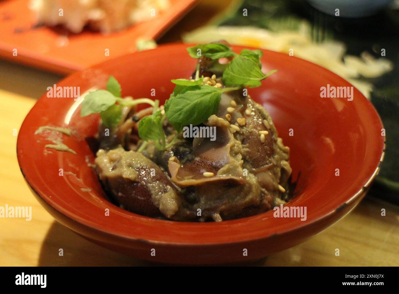 Japanese cuisine : Firefly squid with kanimiso (crab organ) in Kyoto, Japan Stock Photo