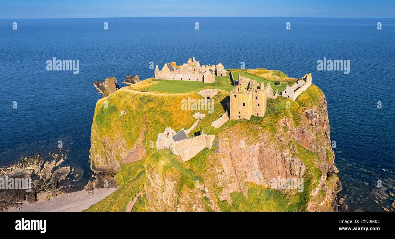 Dunnottar Castle Stonehaven Scotland blue sky and sea the buildings and rocky headland in summer Stock Photo