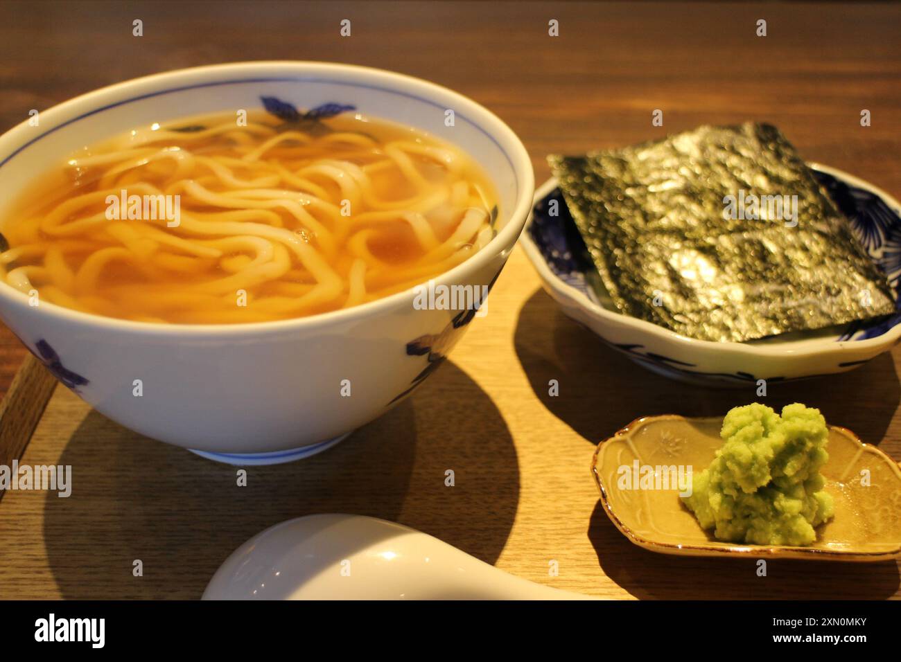 Japanese cuisine : Kake udon noodle with wasabi and seaweed in Kyoto, Japan Stock Photo