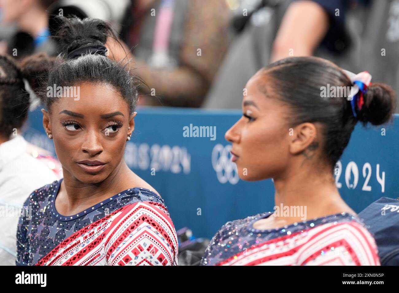 Simone Biles, of the United States, and Jordan Chiles, right, prepare ...