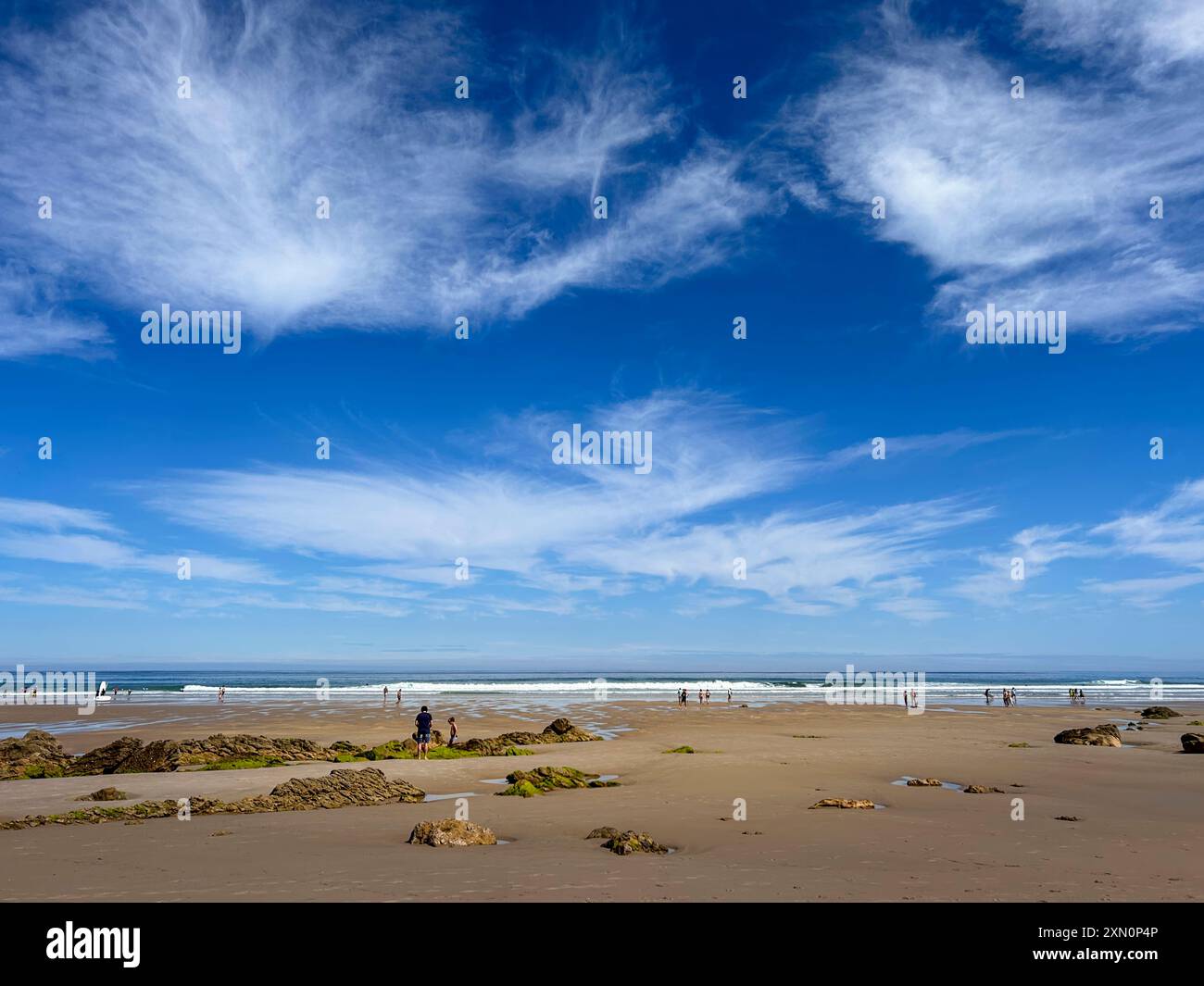 Panoramic view of the beach of Gerra, with blue sky and white clouds ...