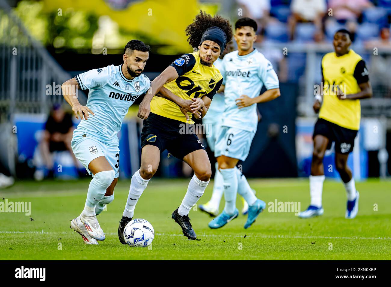 BREDA, Netherlands. 30th July, 2024. football, Rat Verlegh stadium, Dutch  eredivisie, season 2024/2025, during the match NAC - Aris Thessaloniki  (friendly), Aris Thessaloniki player Martin Montoya Torralbo, NAC player  Adam Kaied Credit:, image size:1300x956