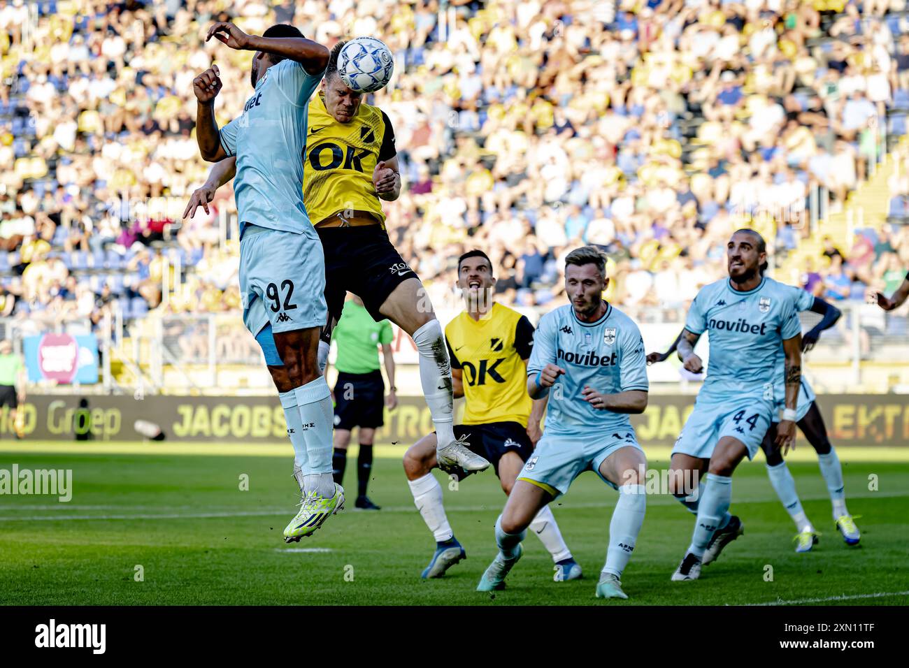 BREDA, Netherlands. 30th July, 2024. football, Rat Verlegh stadium, Dutch  eredivisie, season 2024/2025, during the match NAC - Aris Thessaloniki  (friendly), Aris Thessaloniki player Marc Rose, NAC player Kacper Kostorz  Credit: Pro, image size:1300x956