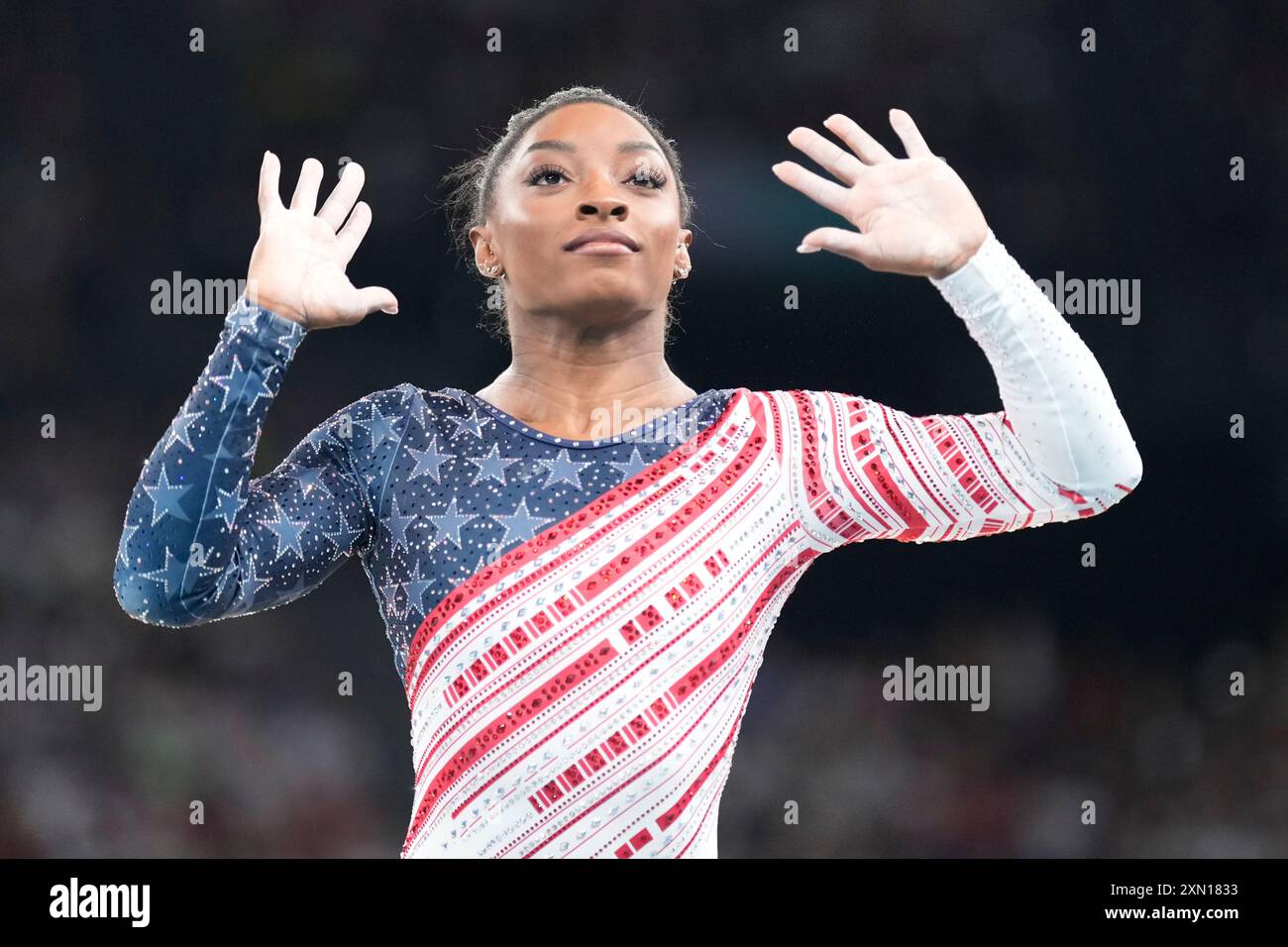 Simone Biles, of the United States, performs on the floor during the ...