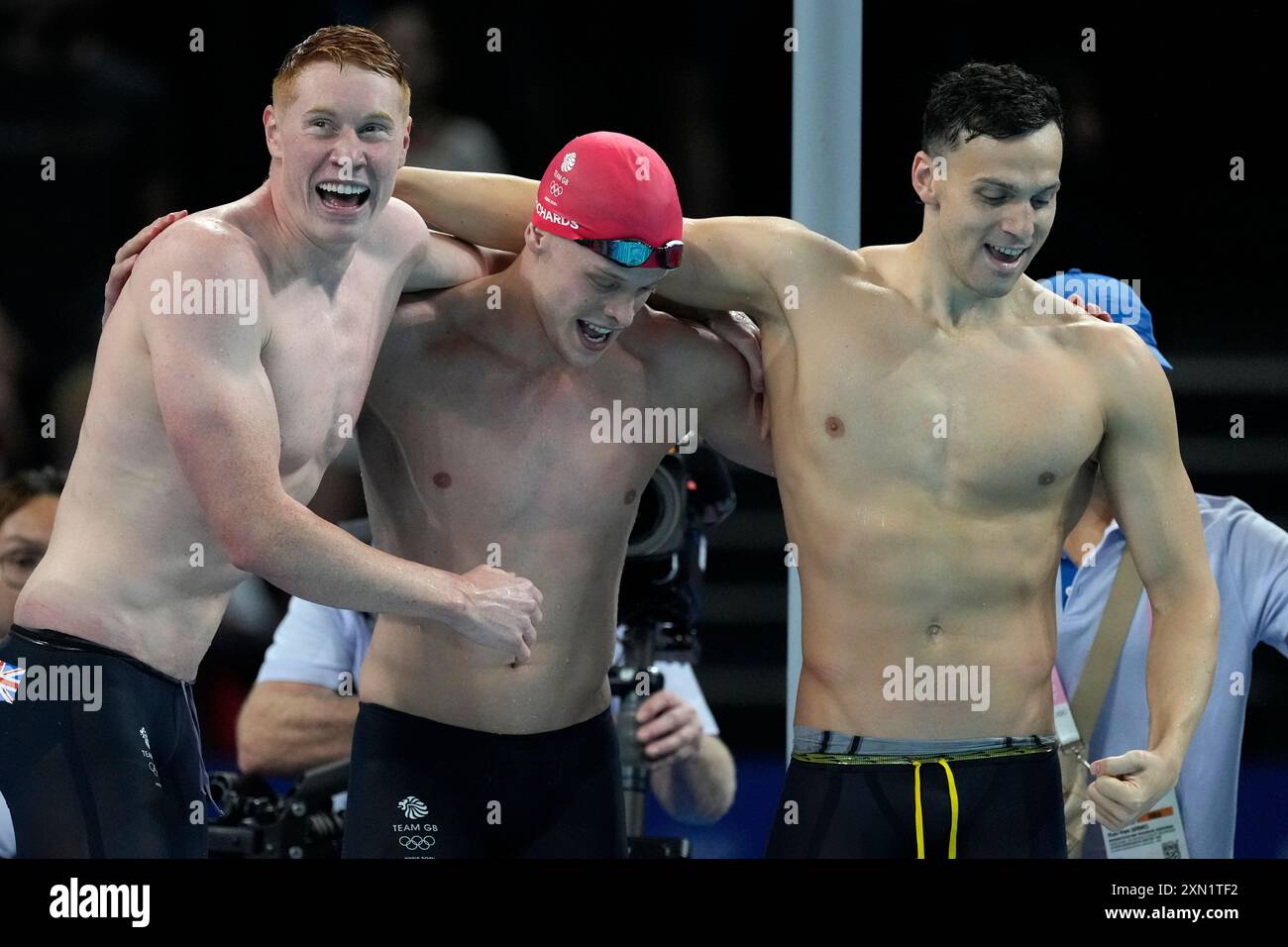 britain-s-men-s-4x200-meter-freestyle-relay-team-celebrates-after