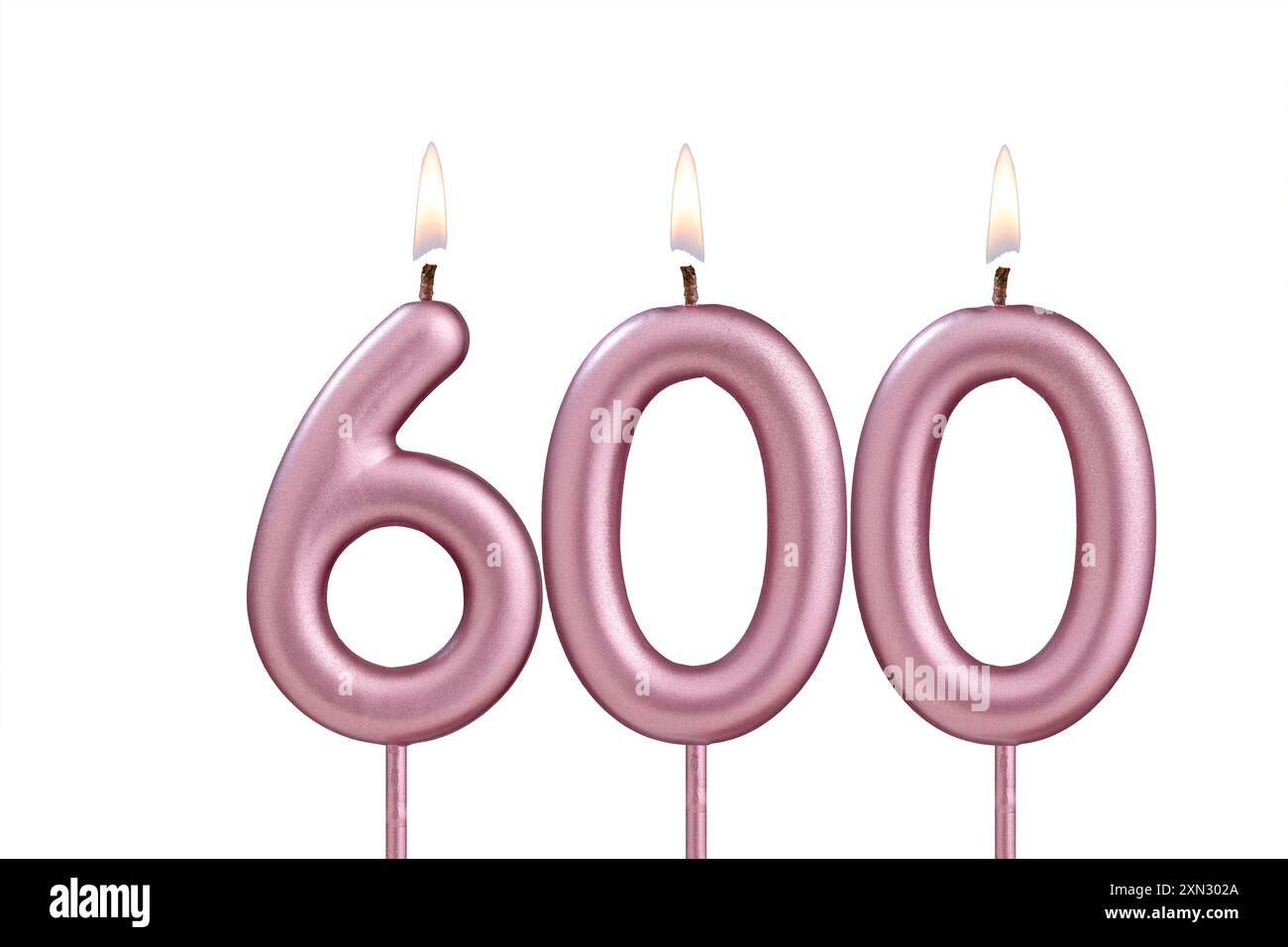 Candle number 600 - Lit birthday candle on white background Stock Photo ...
