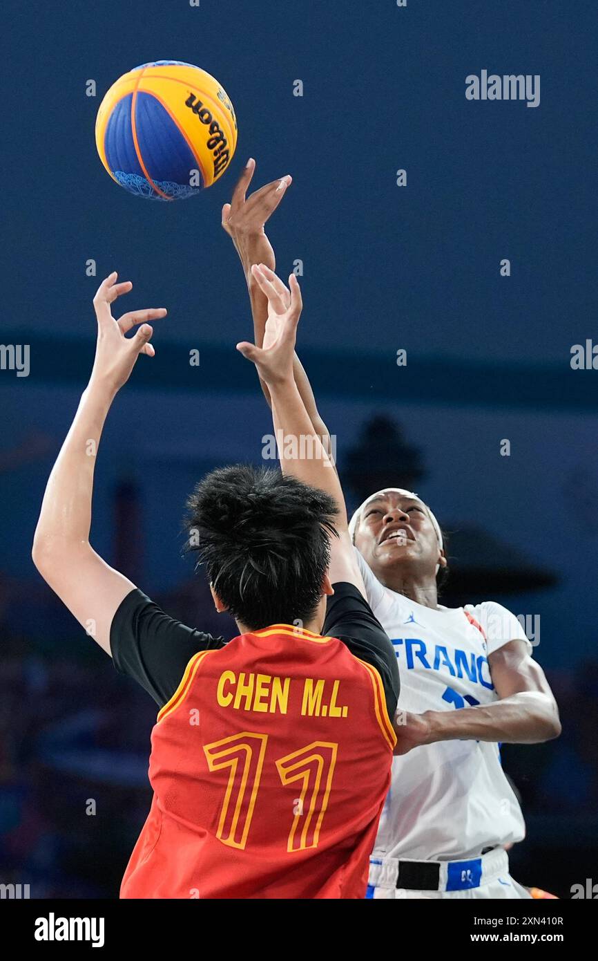 Myriam Djekoundade of France, battles with Chen Mingling of Chinain the ...