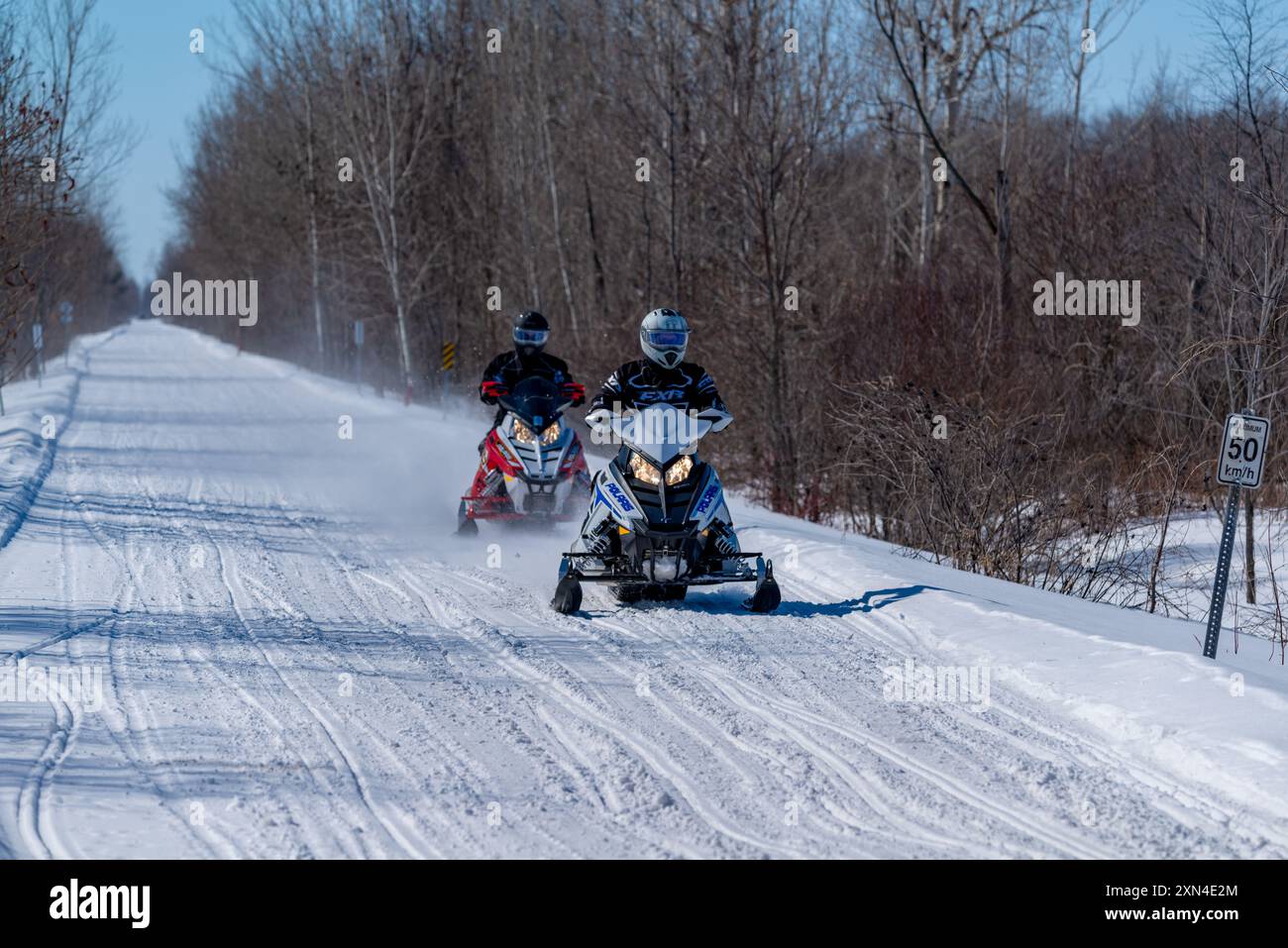 Snowmobile Path Snowmobilers sports hi-res stock photography and images - Alamy