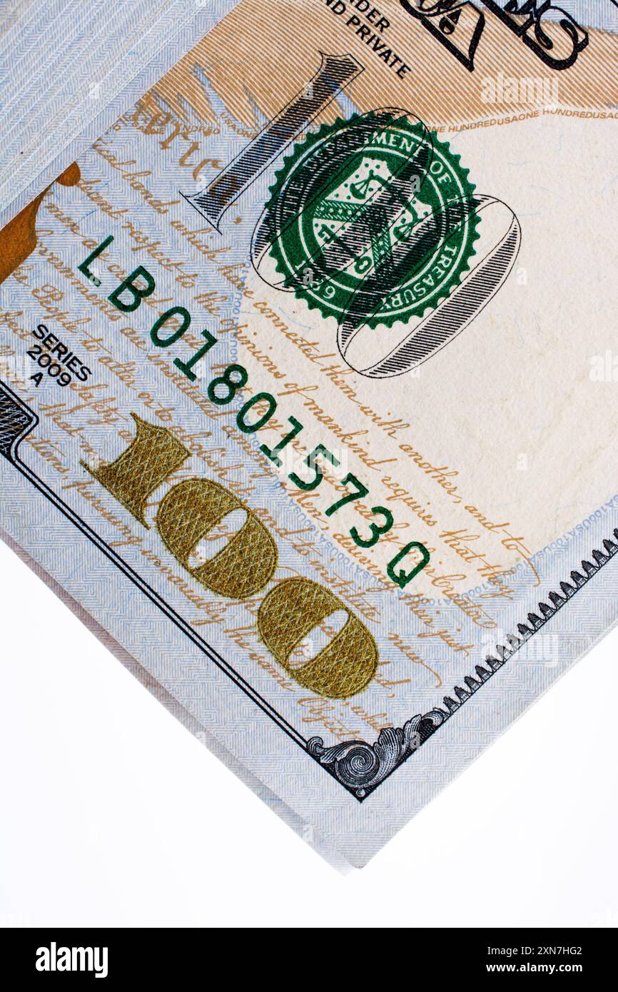 American 100 dollar banknotes made of paper placed on white background ...